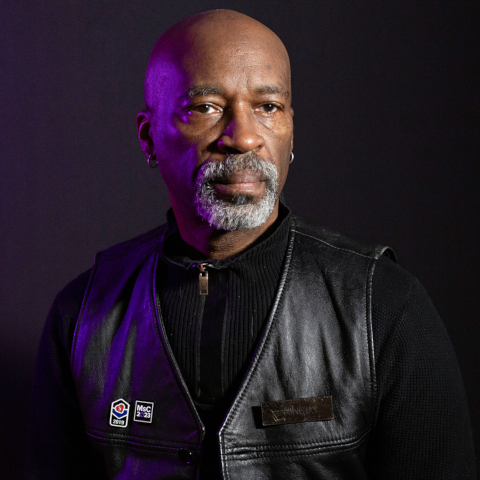 Master Hines headshot in leather jacket